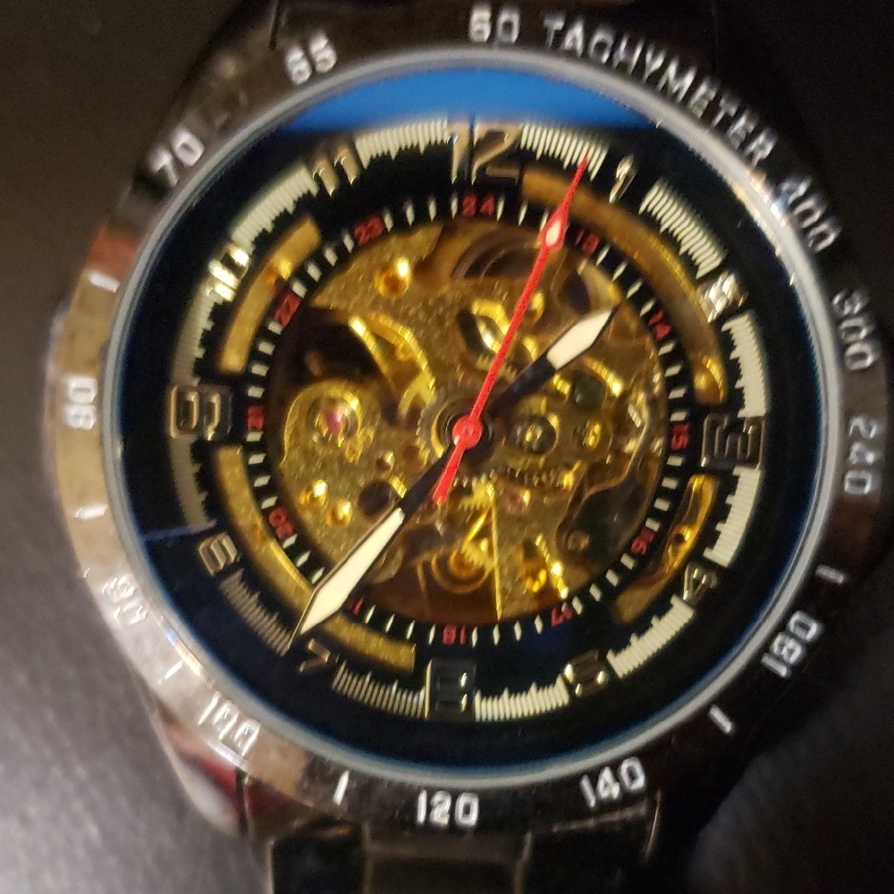 Black and Gold Skeleton Watch